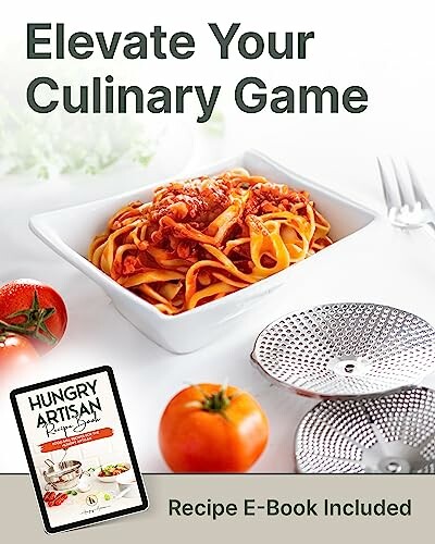 Bowl of pasta with tomatoes and a recipe e-book.